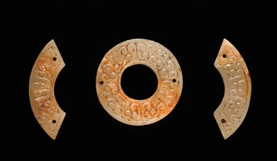 Lot 87 - A SET OF TWELVE WHITE AND RUSSET JADE ORNAMENTS, EASTERN ZHOU DYNASTY