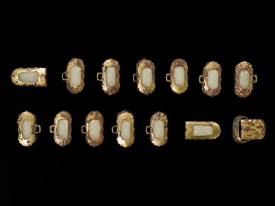 Lot 51 - A SET OF FIFTEEN WHITE JADE AND GILT-BRONZE HARNESS ELEMENTS, LIAO DYNASTY