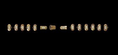 Lot 51 - A SET OF FIFTEEN WHITE JADE AND GILT-BRONZE HARNESS ELEMENTS, LIAO DYNASTY