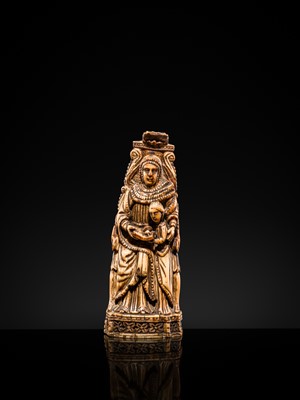 Lot 122 - AN INDO-PORTUGUESE IVORY GROUP DEPICTING SAINT ANNE TEACHING THE VIRGIN TO READ, GOA, LATE 17TH CENTURY