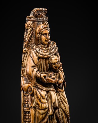 Lot 122 - AN INDO-PORTUGUESE IVORY GROUP DEPICTING SAINT ANNE TEACHING THE VIRGIN TO READ, GOA, LATE 17TH CENTURY