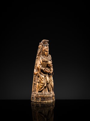 Lot 122 - AN INDO-PORTUGUESE IVORY GROUP DEPICTING SAINT ANNE TEACHING THE VIRGIN TO READ, GOA, LATE 17TH CENTURY