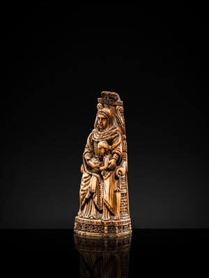 Lot 122 - AN INDO-PORTUGUESE IVORY GROUP DEPICTING SAINT ANNE TEACHING THE VIRGIN TO READ, GOA, LATE 17TH CENTURY