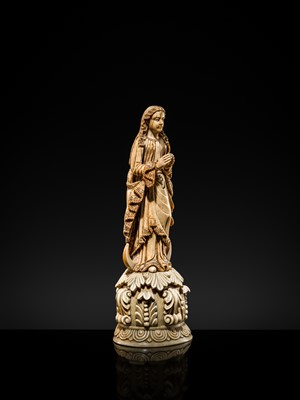 Lot 123 - AN INDO-PORTUGUESE IVORY FIGURE OF OUR LADY OF THE IMMACULATE CONCEPTION, GOA, LATE 17TH CENTURY