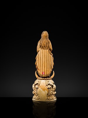 Lot 123 - AN INDO-PORTUGUESE IVORY FIGURE OF OUR LADY OF THE IMMACULATE CONCEPTION, GOA, LATE 17TH CENTURY