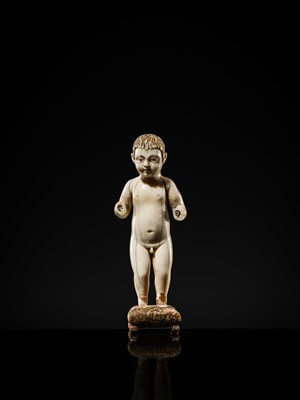 Lot 124 - AN INDO-PORTUGUESE IVORY FIGURE OF THE INFANT CHRIST, GOA, SECOND HALF OF THE 17TH CENTURY