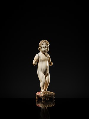 Lot 124 - AN INDO-PORTUGUESE IVORY FIGURE OF THE INFANT CHRIST, GOA, SECOND HALF OF THE 17TH CENTURY