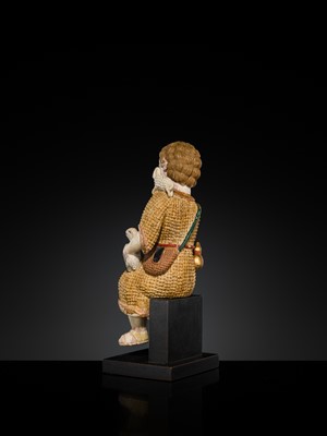 Lot 125 - AN INDO-PORTUGUESE GILT AND POLYCHROME IVORY FIGURE OF CHRIST AS THE GOOD SHEPHERD, GOA, 17TH CENTURY