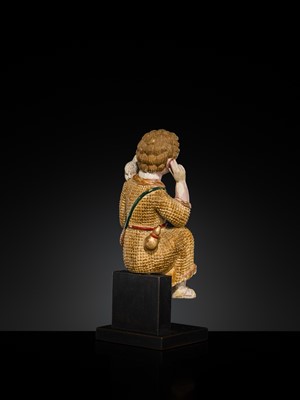 Lot 125 - AN INDO-PORTUGUESE GILT AND POLYCHROME IVORY FIGURE OF CHRIST AS THE GOOD SHEPHERD, GOA, 17TH CENTURY