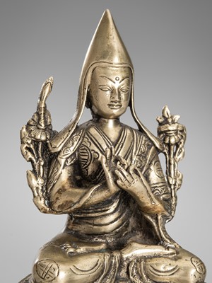Lot 734 - A BRONZE FIGURE OF TSONGKHAPA, TIBET