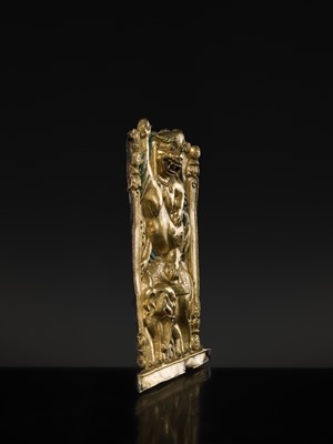 A GILT COPPER REPOUSSÉ ‘LION AND ELEPHANT’ PANEL, TIBET, 17TH-18TH CENTURY