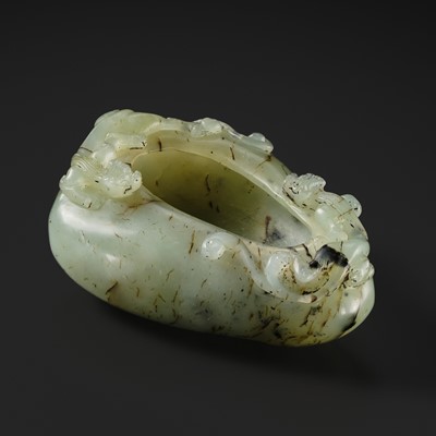 Lot 174 - A CELADON AND BROWN JADE ‘CHILONG’ BRUSHWASHER, EARLY QING DYNASTY