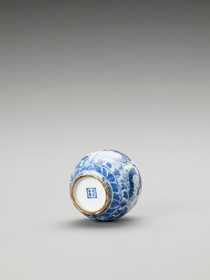 Lot 651 - A SMALL BLUE AND WHITE ‘DRAGON’ VASE