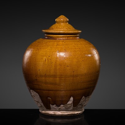 Lot 201 - AN AMBER-GLAZED POTTERY JAR AND COVER, TANG DYNASTY