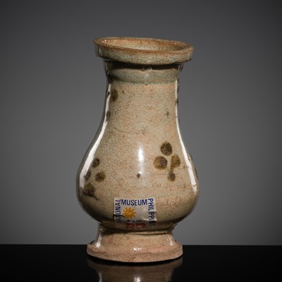 Lot 225 - A SMALL IRON-SPOTTED QINGBAI HU VASE, SONG TO YUAN DYNASTY