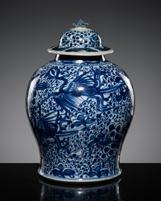 Lot 249 - A BLUE AND WHITE PORCELAIN ‘PHOENIX’ JAR AND COVER, KANGXI PERIOD