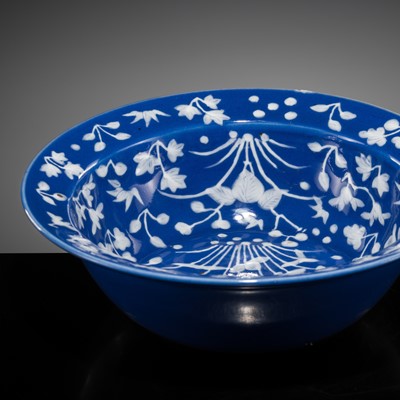 Lot 262 - A POWDER-BLUE-GROUND SLIP-DECORATED DISH, QING DYNASTY