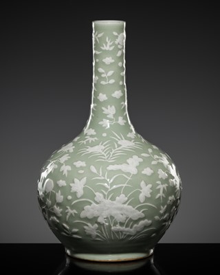 Lot 261 - A CELADON-GROUND SLIP-DECORATED VASE, QING DYNASTY