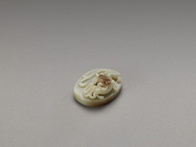Lot 775 - A CELADON AND RUSSET ‘CHILONG AND PHEONIX’ JADE DISC, LATE QING