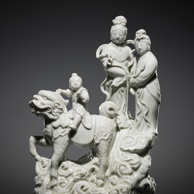 Lot 271 - A DEHUA FIGURAL GROUP OF GUANYIN WITH ATTENDANTS AND QILIN, REPUBLIC PERIOD