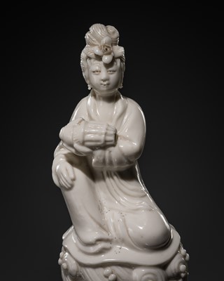 Lot 272 - A DEHUA PORCELAIN FIGURE OF A CELESTIAL MAIDEN, c. 1920s
