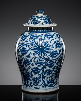 Lot 258 - A BLUE AND WHITE PORCELAIN ‘LOTUS’ JAR AND COVER, QING DYNASTY