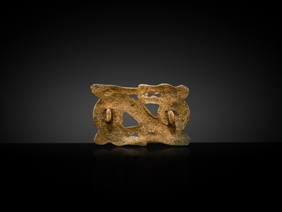 Lot 88 - A GILT-BRONZE ‘WOLF’ OPENWORK PLAQUE, NORTHWEST CHINA, 3RD-1ST CENTURY BC