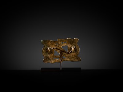 Lot 88 - A GILT-BRONZE ‘WOLF’ OPENWORK PLAQUE, NORTHWEST CHINA, 3RD-1ST CENTURY BC