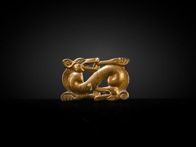 Lot 88 - A GILT-BRONZE ‘WOLF’ OPENWORK PLAQUE, NORTHWEST CHINA, 3RD-1ST CENTURY BC