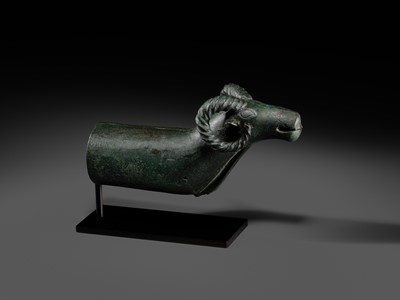 Lot 116 - A ‘RAM'S HEAD’ BRONZE CHARIOT FITTING, WESTERN MONGOLIA, CIRCA 4TH-3RD CENTURY BC