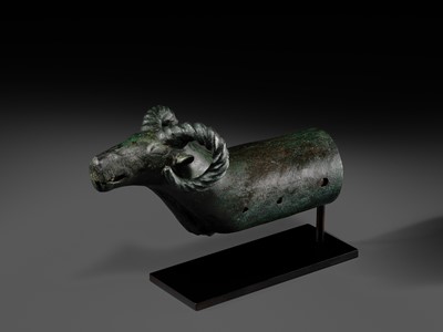 Lot 116 - A ‘RAM'S HEAD’ BRONZE CHARIOT FITTING, WESTERN MONGOLIA, CIRCA 4TH-3RD CENTURY BC