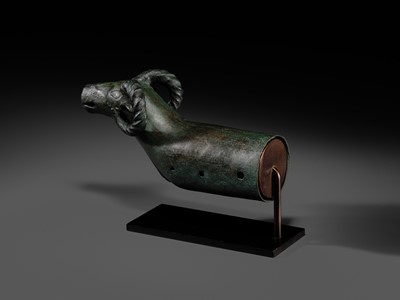 Lot 116 - A ‘RAM'S HEAD’ BRONZE CHARIOT FITTING, WESTERN MONGOLIA, CIRCA 4TH-3RD CENTURY BC