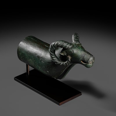 Lot 116 - A ‘RAM'S HEAD’ BRONZE CHARIOT FITTING, WESTERN MONGOLIA, CIRCA 4TH-3RD CENTURY BC