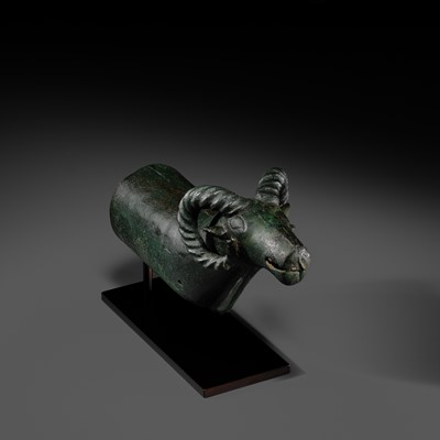 Lot 116 - A ‘RAM'S HEAD’ BRONZE CHARIOT FITTING, WESTERN MONGOLIA, CIRCA 4TH-3RD CENTURY BC