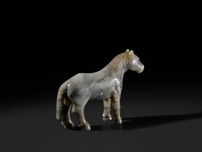A MOTTLED GRAY JADE FIGURE OF A HORSE, LATE MING-EARLY QING DYNASTY