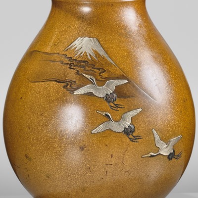 Lot 30 - HIDEKANE: A GOLD-SPECKLED MIXED-METAL-INLAID ‘MOUNT FUJI AND CRANES’ BRONZE VASE