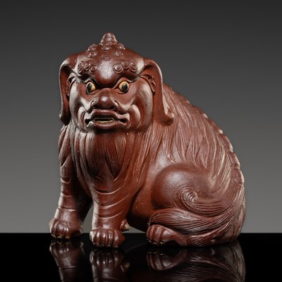 Lot 548 - AN YIXING FIGURE OF A MYTHICAL BEAST, QING DYNASTY