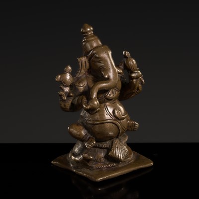 Lot 624 - A BRONZE FIGURE OF GANESHA, SOUTH INDIA, 17TH-18TH CENTURY