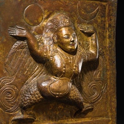 Lot 273 - A LARGE GILT-COPPER ALLOY REPOUSSÉ PLAQUE OF A KINNARI, TIBET, 17TH CENTURY