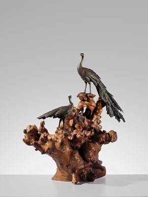 SEIYA: A LARGE BRONZE OKIMONO OF TWO PEACOCKS ON A BURLWOOD STUMP