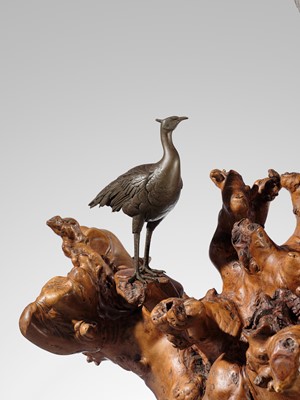 SEIYA: A LARGE BRONZE OKIMONO OF TWO PEACOCKS ON A BURLWOOD STUMP