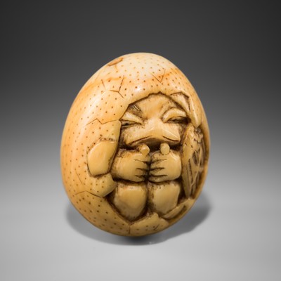 Lot 450 - A FINE MARINE IVORY NETSUKE OF A HATCHING TENGU (TENGU NO TOMAGO)