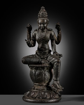 Lot 658 - A BRONZE FIGURE OF AVALOKITESHVARA, MAJAPAHIT PERIOD