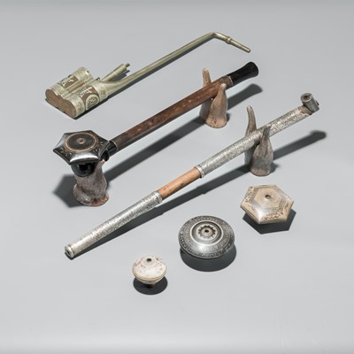 Lot 247 - A GROUP OF THREE WOOD AND METAL OPIUM PIPES WITH YIXING STONEWARE PIPE BOWLS, CHINA, 19TH-20TH CENTURY