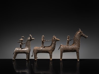 Lot 86 - A GROUP OF THREE KONDH TRIBAL BRONZES OF WARRIORS ON HORSEBACK, EASTERN INDIA, LATE 19TH-EARLY 20TH CENTURY