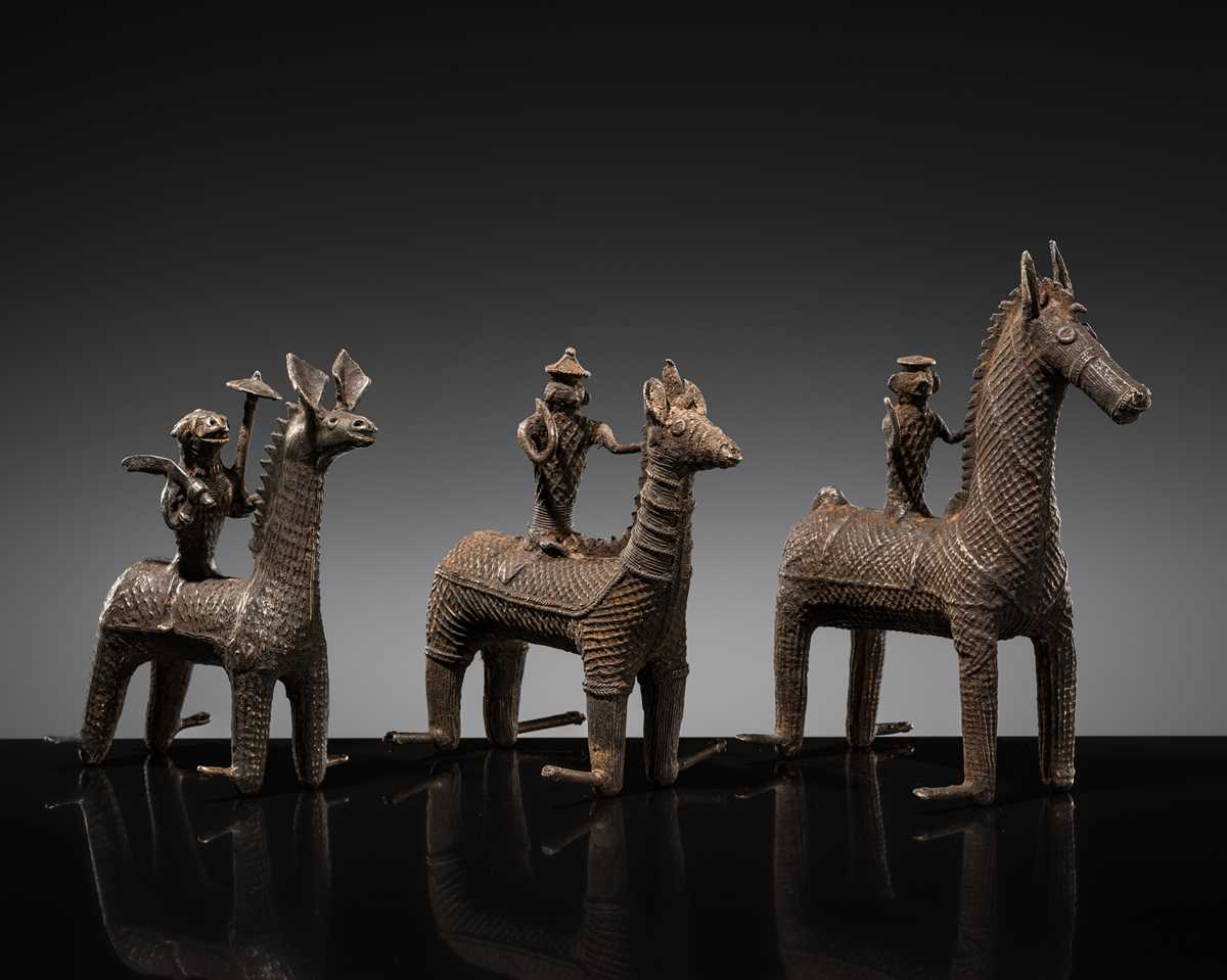 Lot 86 - A GROUP OF THREE KONDH TRIBAL BRONZES OF WARRIORS ON HORSEBACK, EASTERN INDIA, LATE 19TH-EARLY 20TH CENTURY