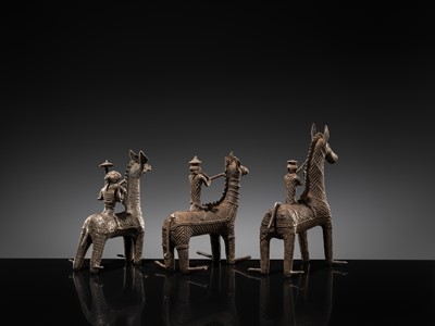 Lot 86 - A GROUP OF THREE KONDH TRIBAL BRONZES OF WARRIORS ON HORSEBACK, EASTERN INDIA, LATE 19TH-EARLY 20TH CENTURY