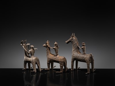 Lot 86 - A GROUP OF THREE KONDH TRIBAL BRONZES OF WARRIORS ON HORSEBACK, EASTERN INDIA, LATE 19TH-EARLY 20TH CENTURY