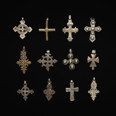 Lot 259 - A GROUP OF TWELVE ETHIOPIAN MIXED METAL COPTIC PENDANT CROSSES