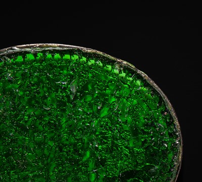 Lot 106 - A GOLD AND STAINED GLASS (THEWA) PENDANT AND PLAQUE, 19TH CENTURY